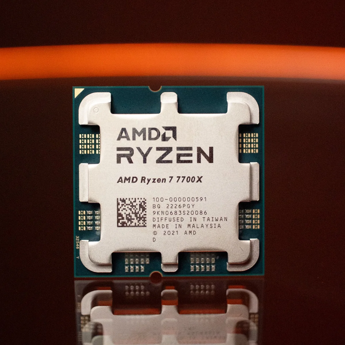 AMD Ryzen 7 7700X tray processor, chip front view