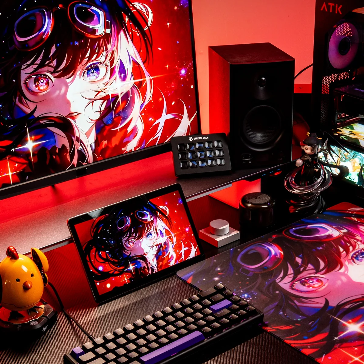 ATK Crimson glass mouse pad in a gaming setup