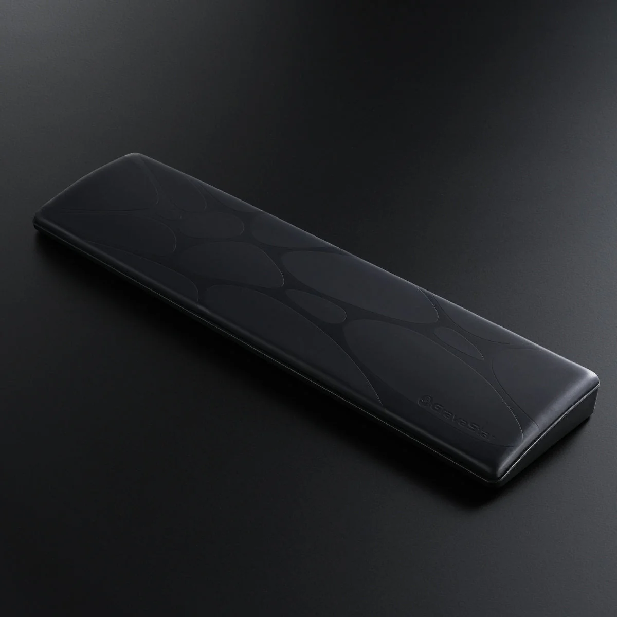 GravaStar Keyboard Wrist Rest Pad in the 60% size, showing the soft PU leather surface over a memory foam interior